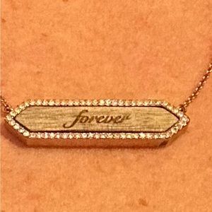 Stella and dot necklace says “forever”
